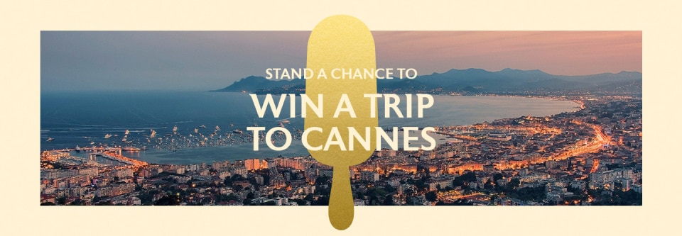Magnum promotion featuring a gold ice cream bar silhouette over Cannes at sunset. Text reads: Stand a chance to win a trip to Cannes.