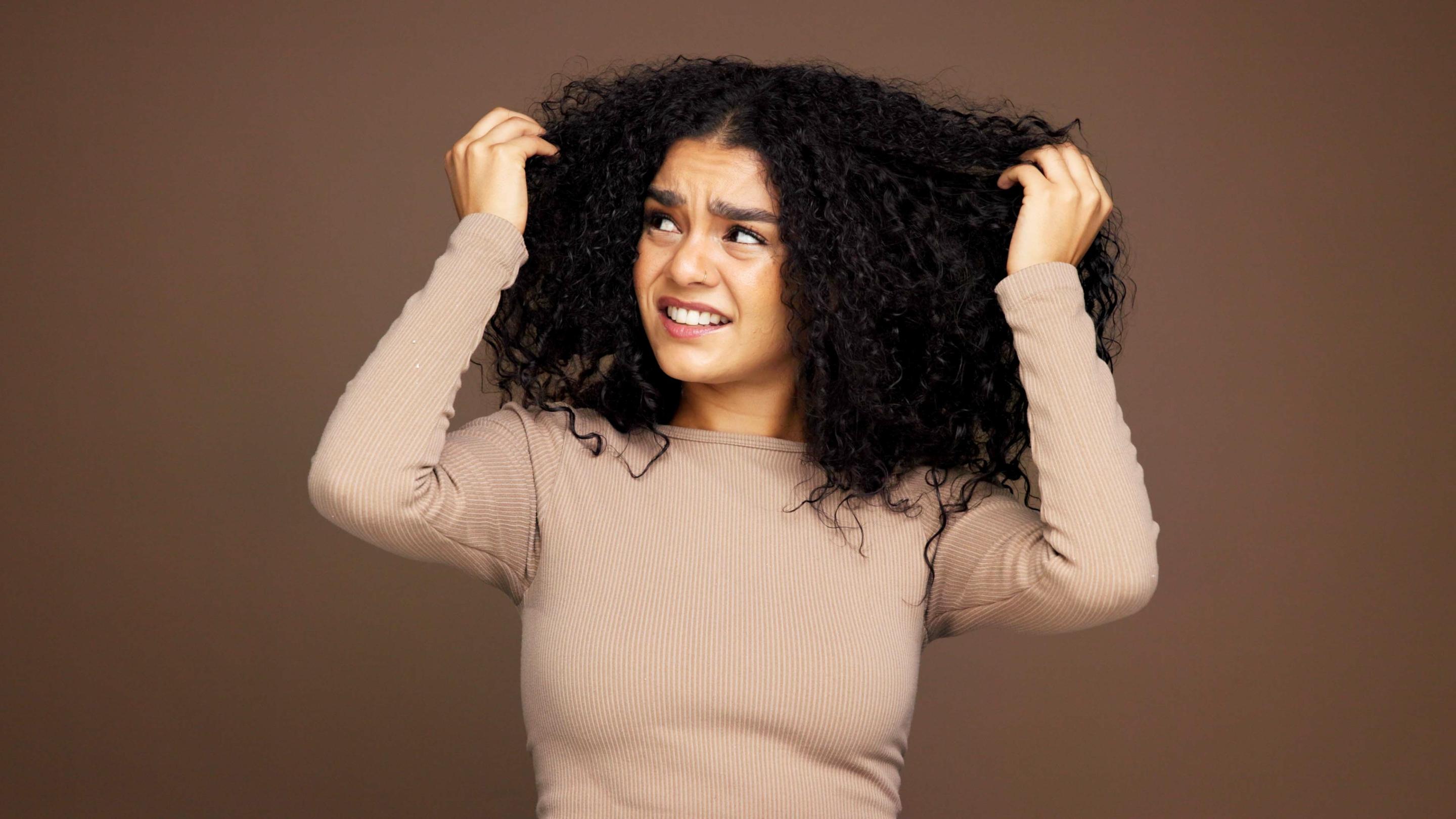 Reduces Frizz and Improves Manageability