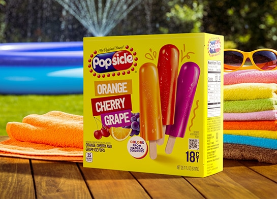 Popsicle® Orange, Cherry & Grape Ice Pops outside in summer