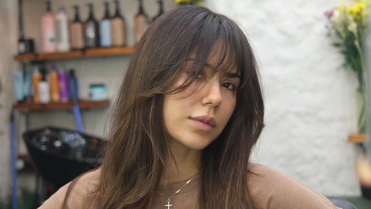 30. Straight Step Cut with Side Bangs