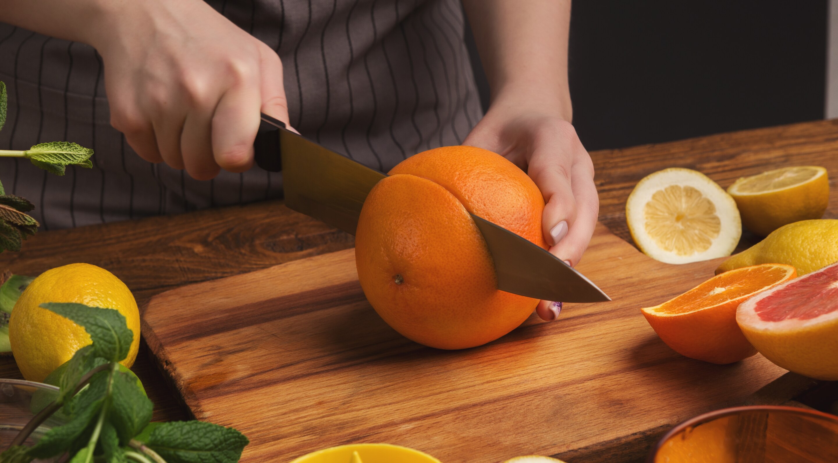Step 3:  Cut the Oranges in Half Image
