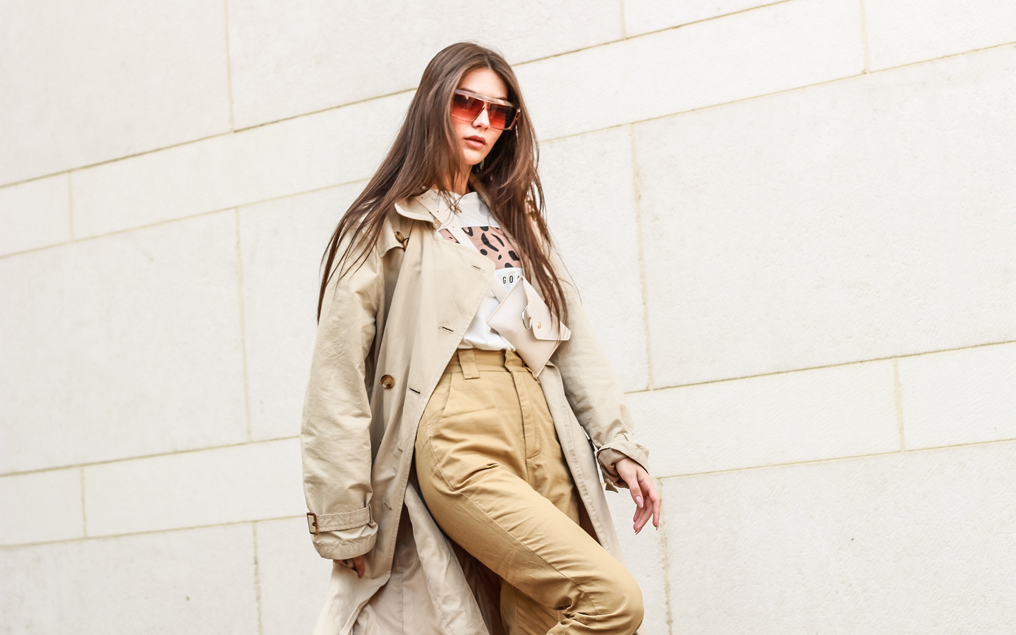Stylish woman following spring hair trends with glossy hair