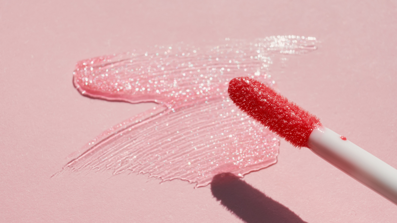 Glossy lips complete the look
