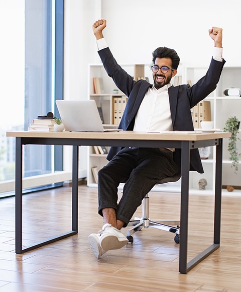 Man in office raising his arm wearing strong deodorant for men 