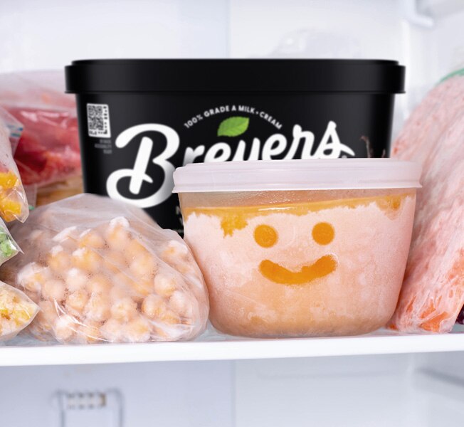 Tub of Breyers ice cream in a home freezer