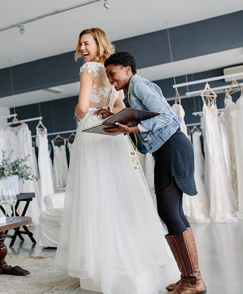 ride trying on her wedding dress before her wedding 