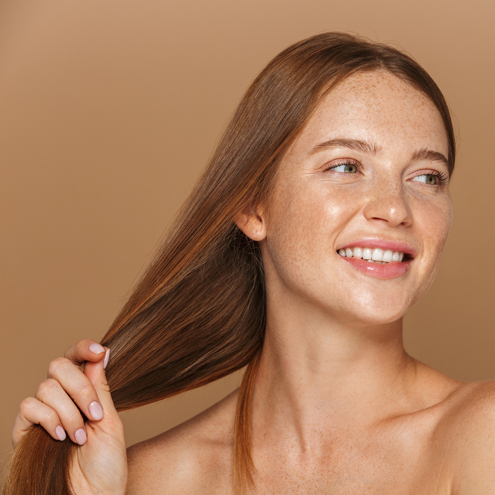 Woman with strong, healthy-looking red hair.
