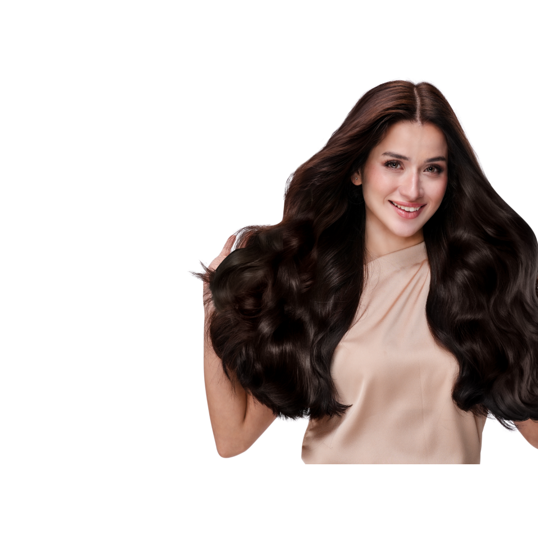 A stylish woman with bright blue sunglasses crossing the street and smiling as the wind blows her long, sleek brown hair.
