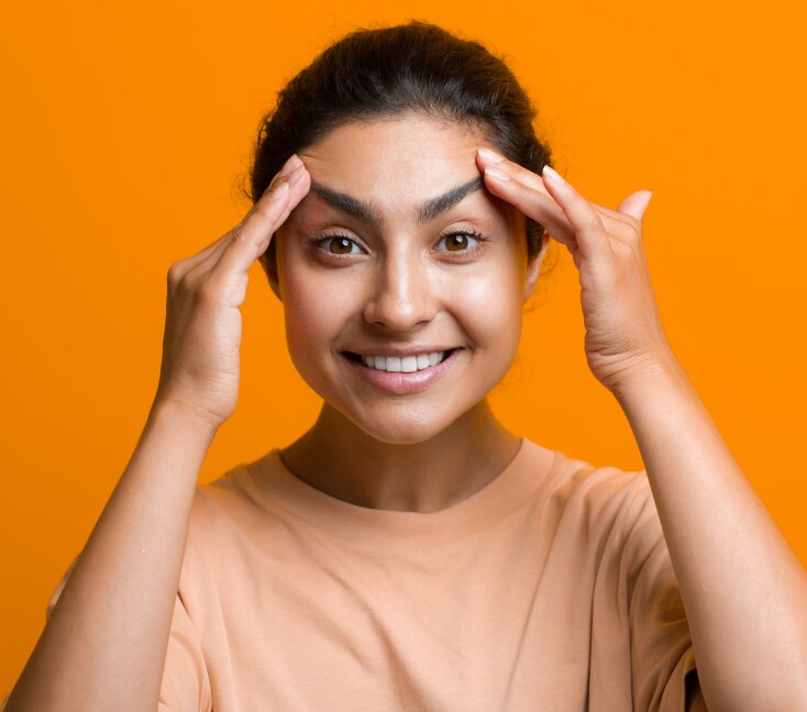 Image of Face Yoga: What It Is, Benefits & Daily Exercises for Glowing Skin