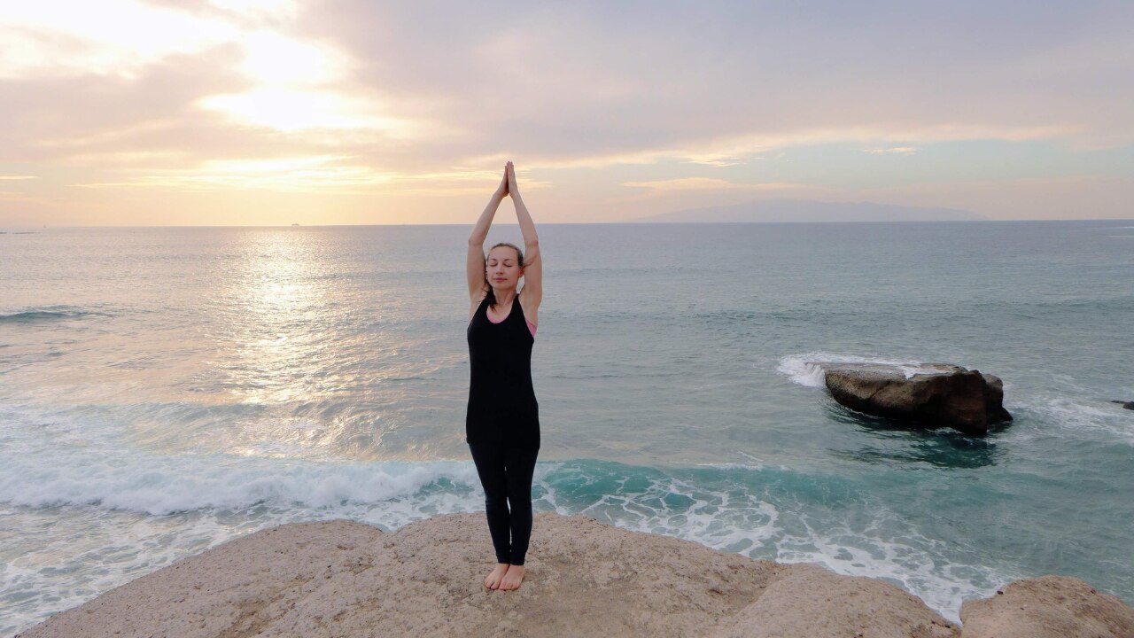 1. Tadasana (Mountain Pose)