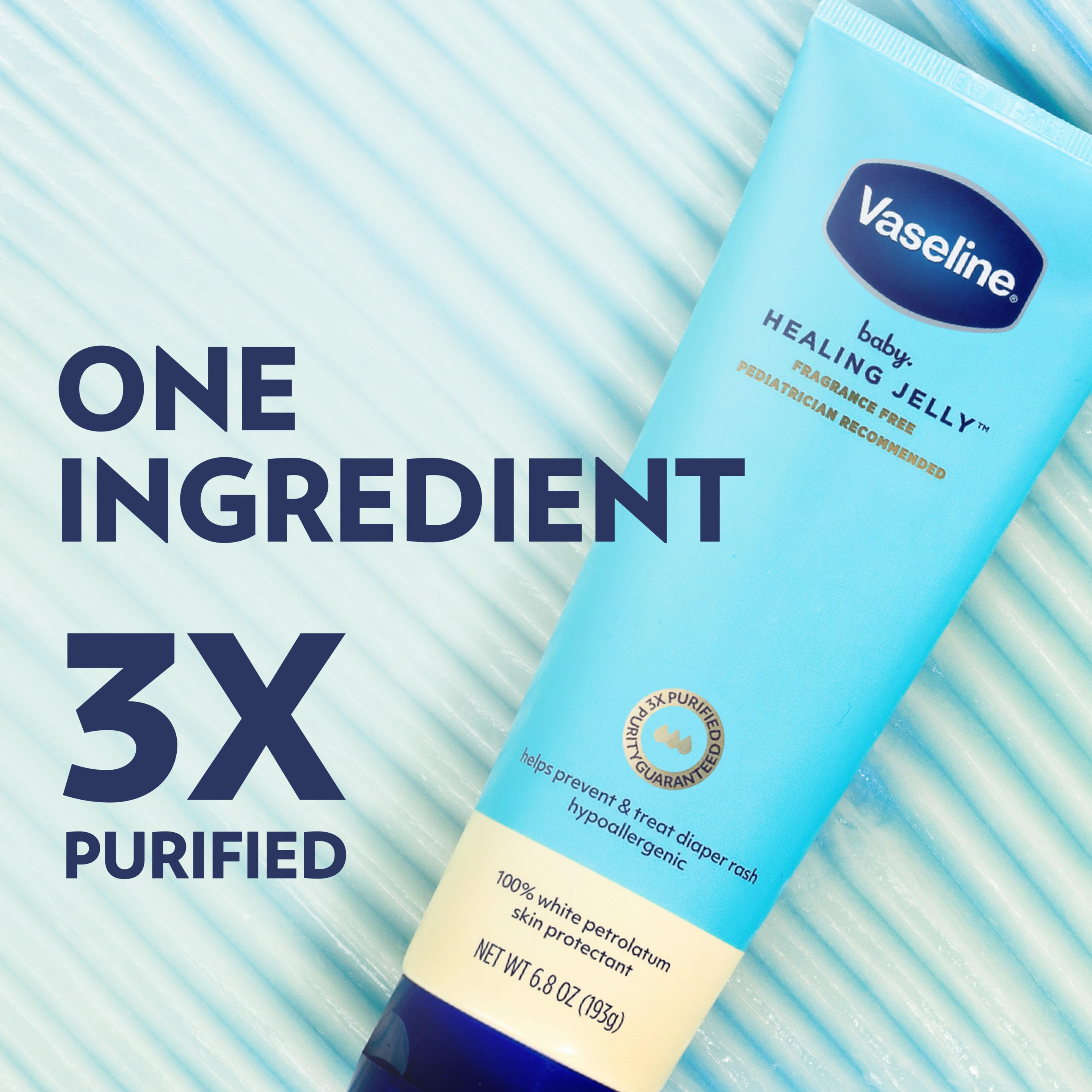 A tube of Vaseline Baby Healing Jelly on a light blue textured background with text