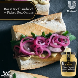 Maille roast beef sandwich with picked red onions article