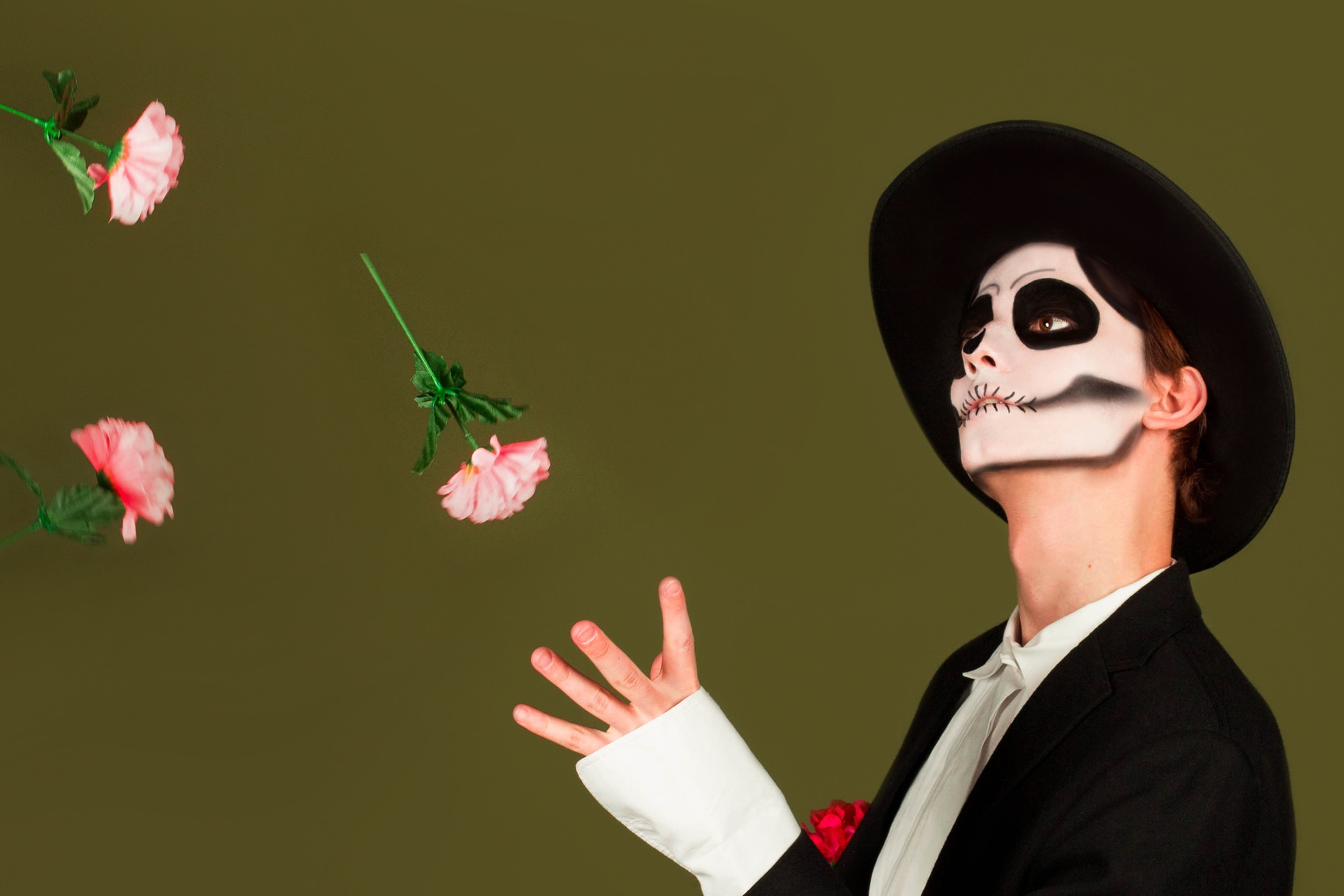 Young guy in Halloween zombie costume looking comfortable because he knows how to stay fresh