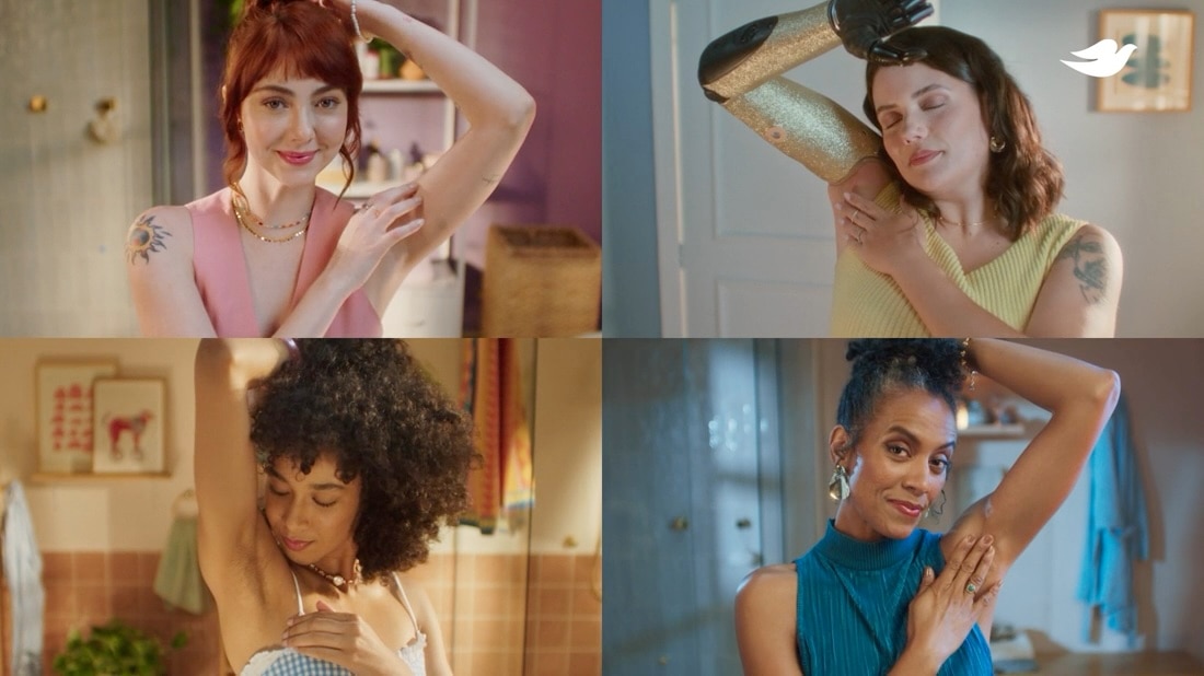 quatro mulheres sentem suas axilas macias após usar dove