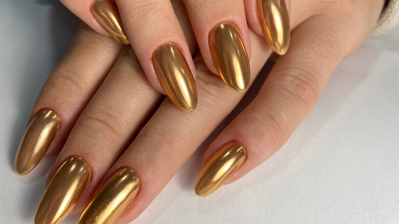 4. Gold Chrome Nails