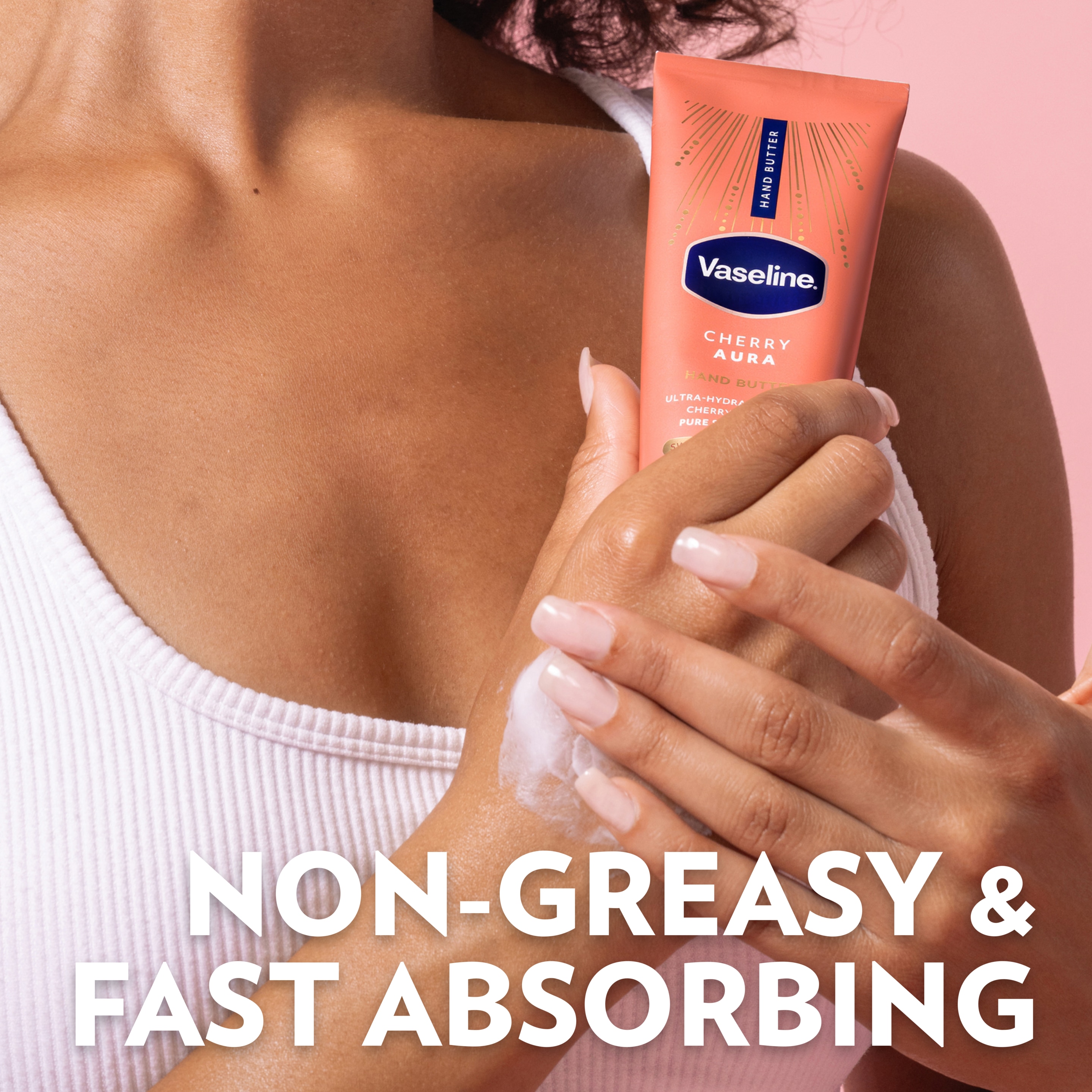 A close-up shows Vaseline Cherry Aura Hand Butter being applied to the back of a hand, with text