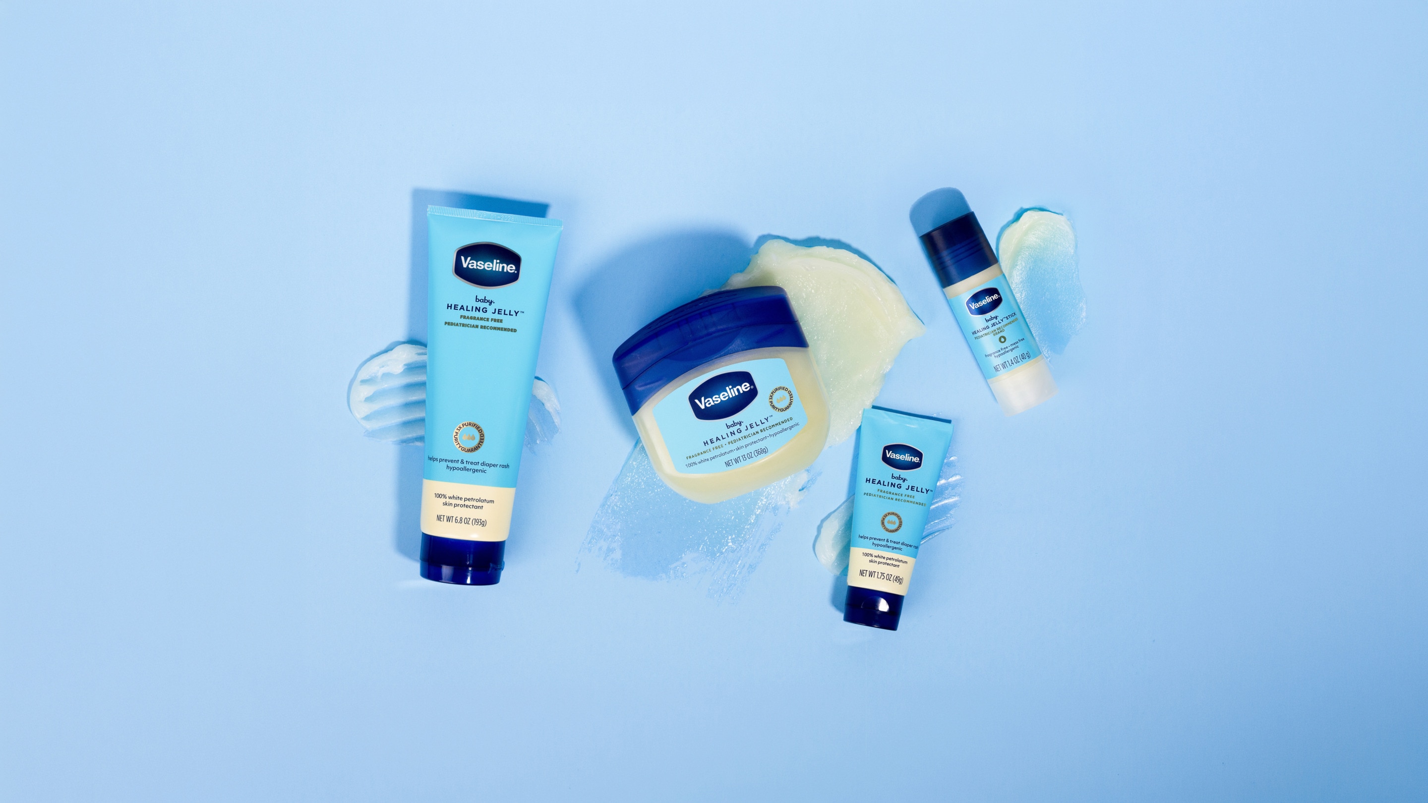 Vaseline Baby Healing Jelly range displayed on a light blue background.