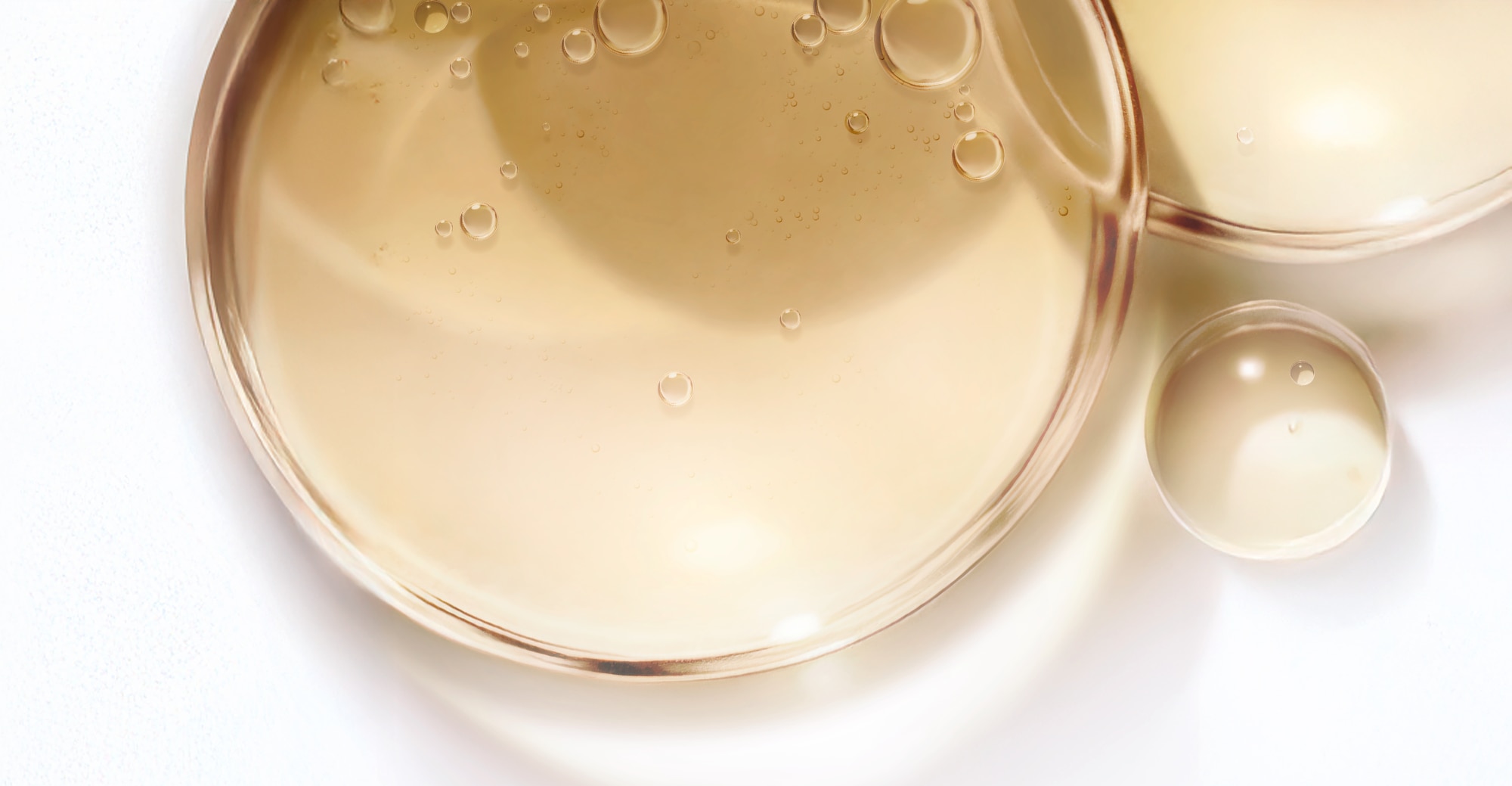 Serum droplet against white background