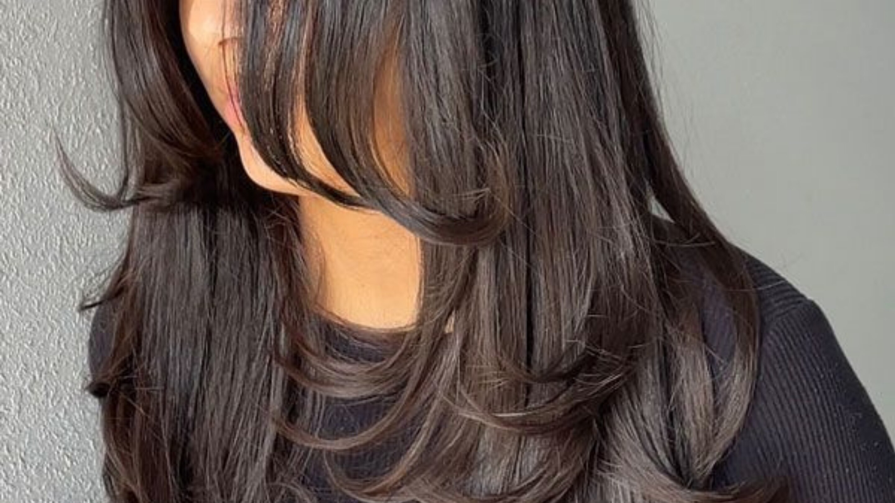 18. Short Step Cut with Wispy Ends