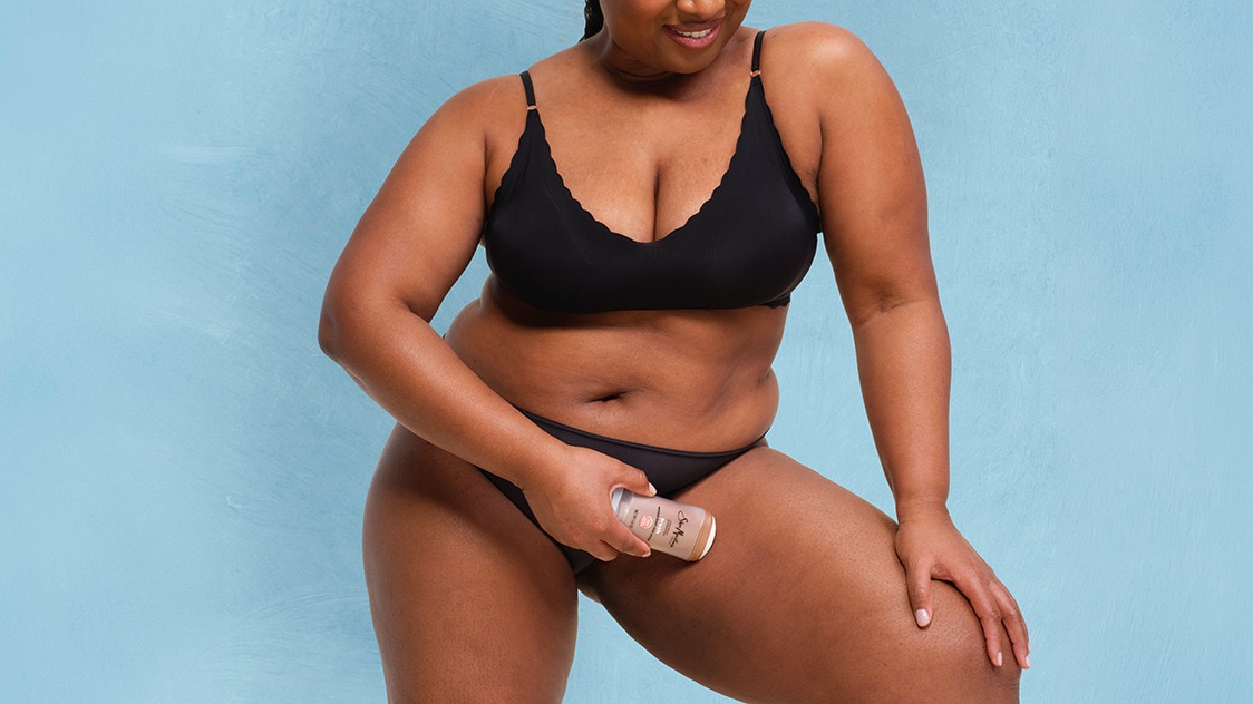 Woman using whole body deodorant on inner thighs to stay fresh all day