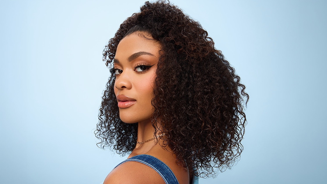 Woman with defined, type 3 curls