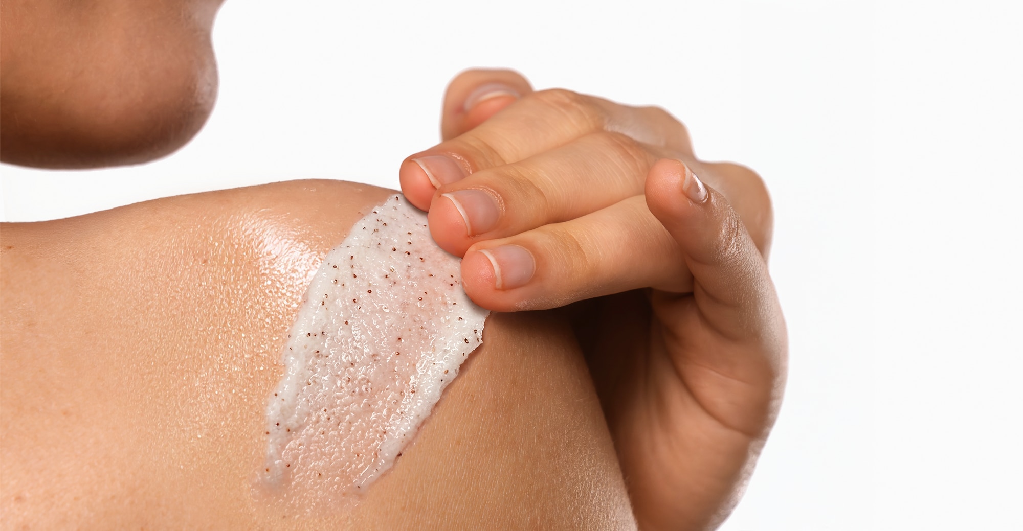 Body scrub swatch against woman's back