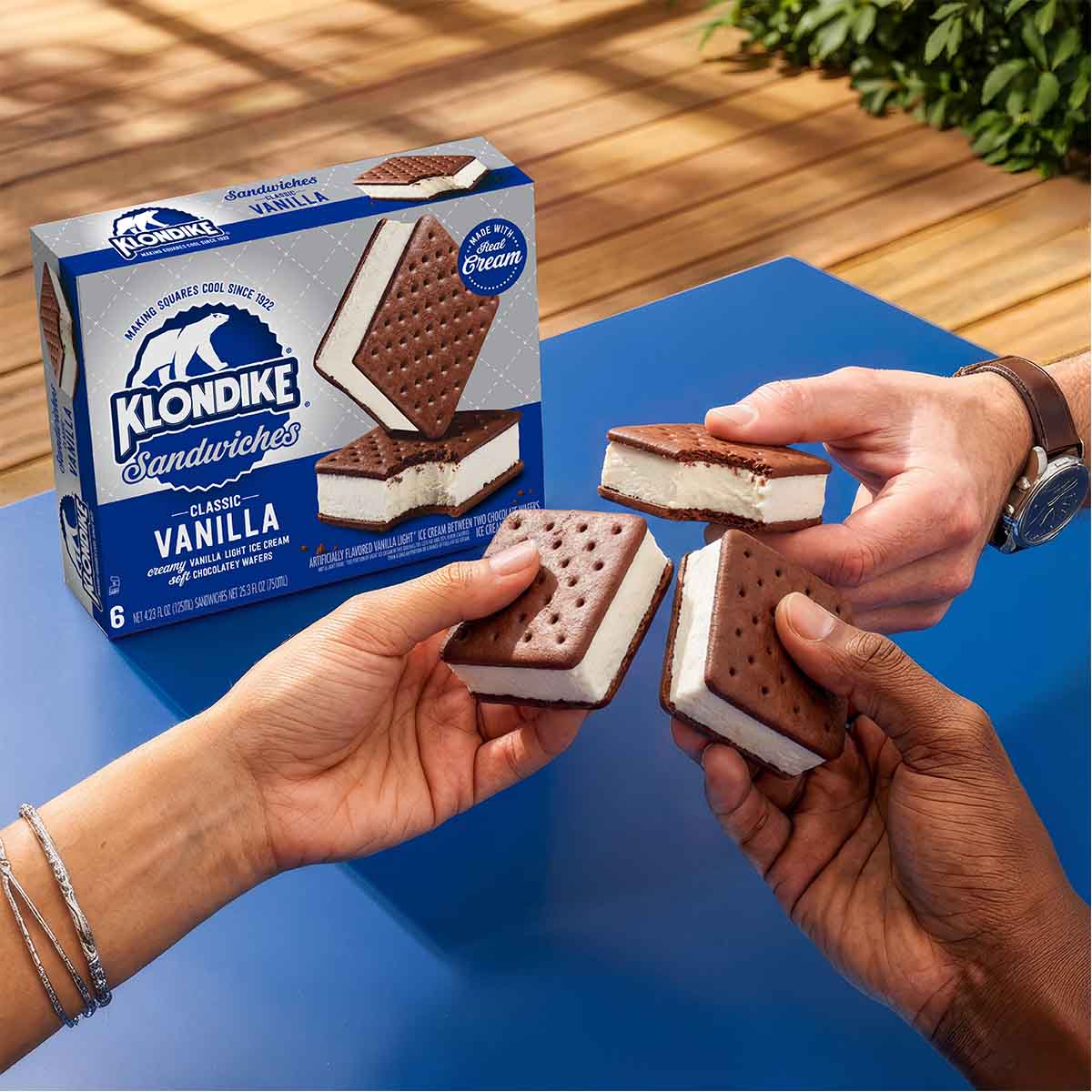 Friends enjoying Klondike Vanilla ice cream bars together