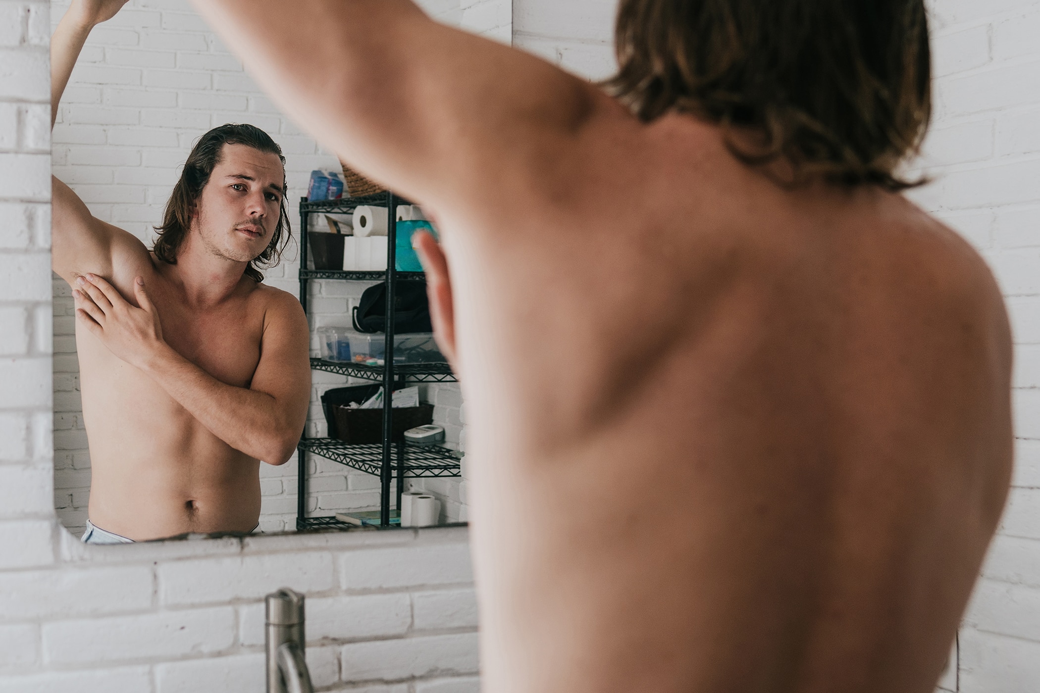 Man looking in the mirror