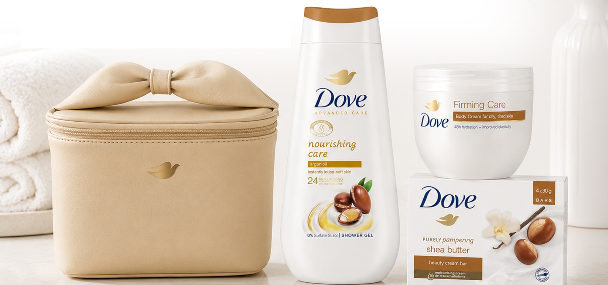 Dove Toiletry bag on a counter with 4 pack soap, bodywash and a body cream
