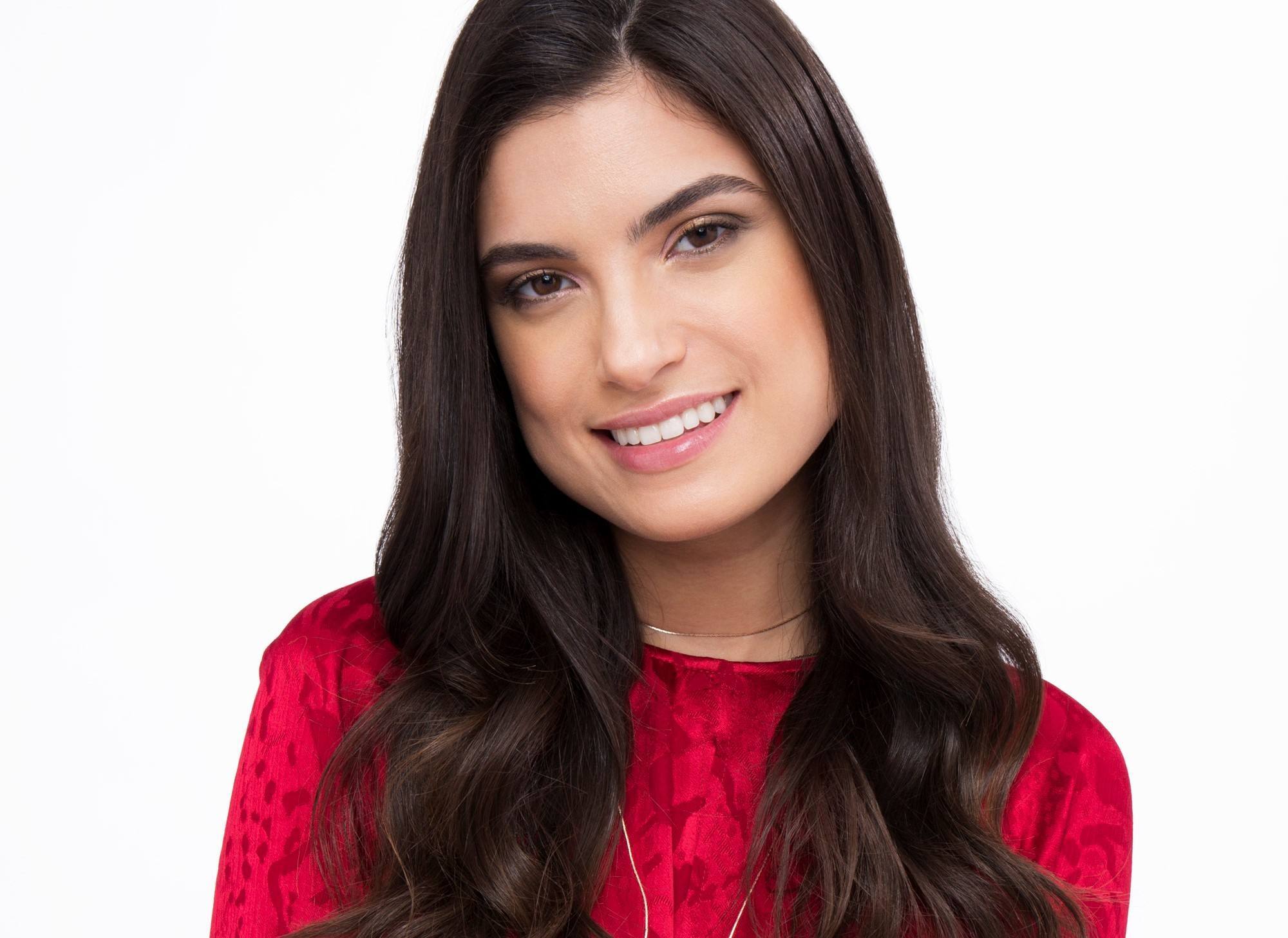 Woman with dark brown balayage straight hair