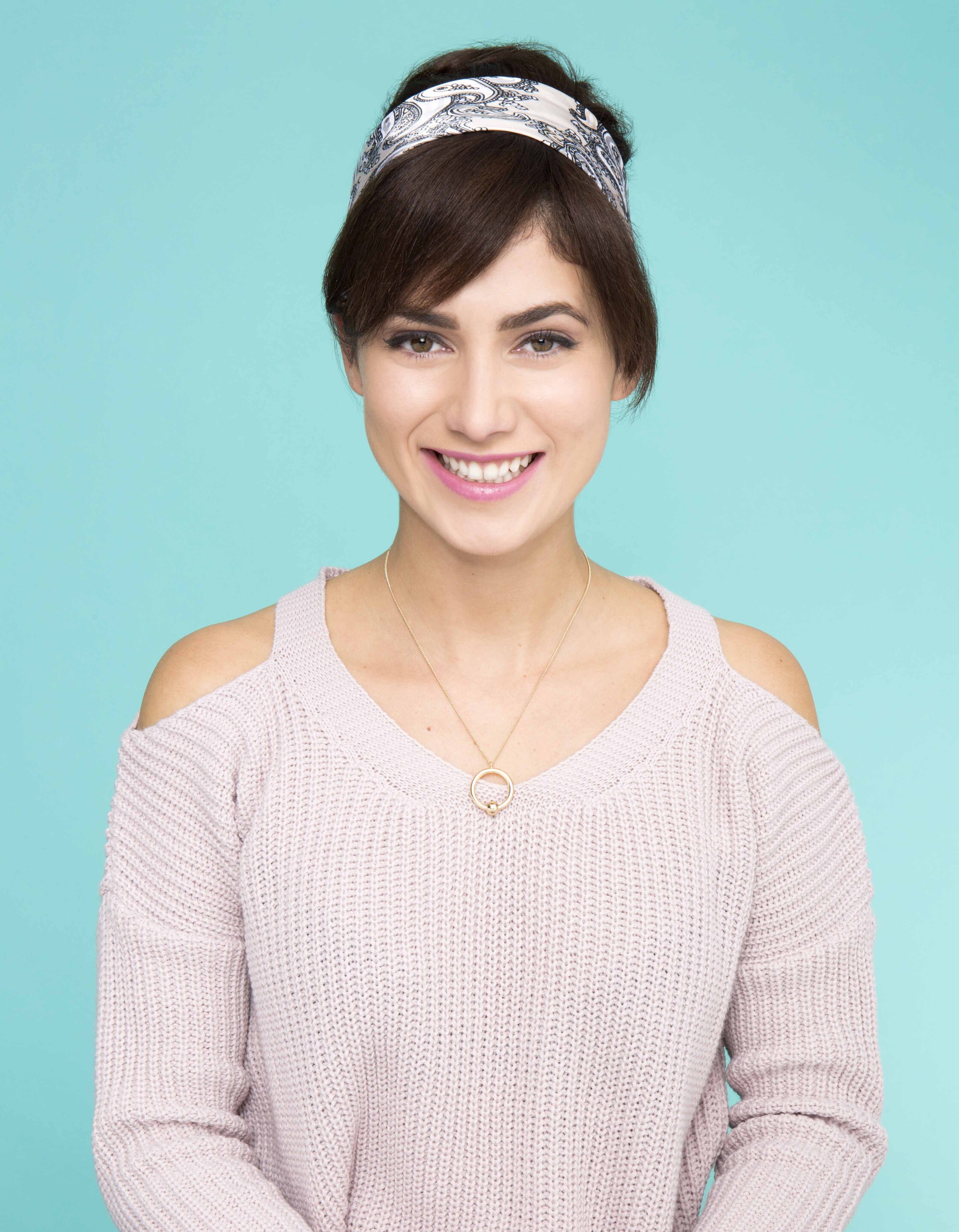 Gibson girl hair tutorial: YouTuber Nikki Secret with brunette hair in a vintage Gibson girl hairstyle