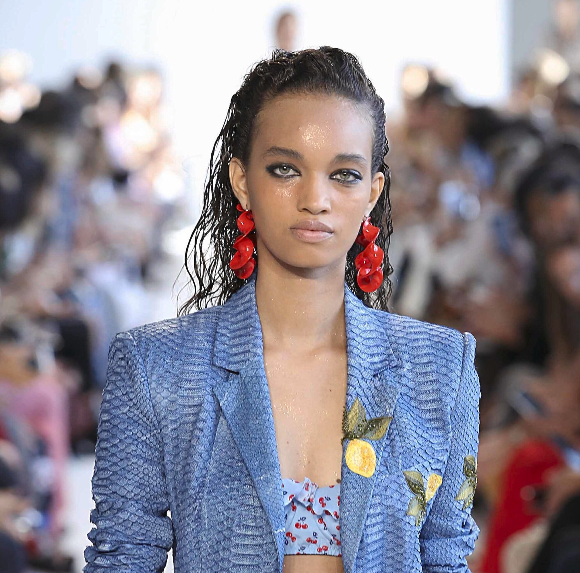 Ideas for crazy hair day: Runway model with dark brunette wet look slicked back hair