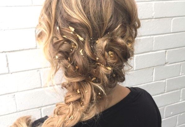 Woman with light brown foil highlights