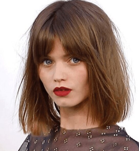 Woman with dark brown balayage straight hair