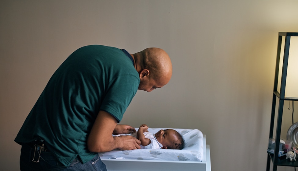 Happy father hugging his child