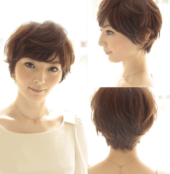 Woman with mushroom cut with wet look spiked hair
