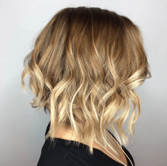 Woman with dark brown balayage straight hair