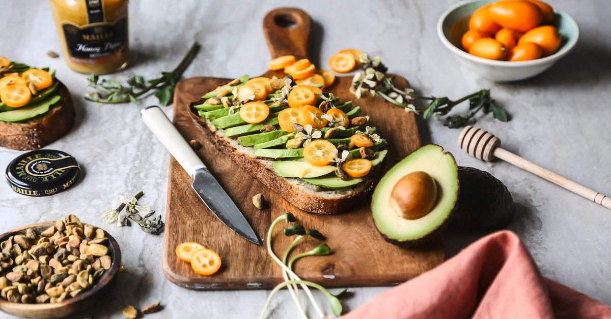 Maille Avocado Kumquat Tartine with Maille Honey Dijon &amp; Pistachios