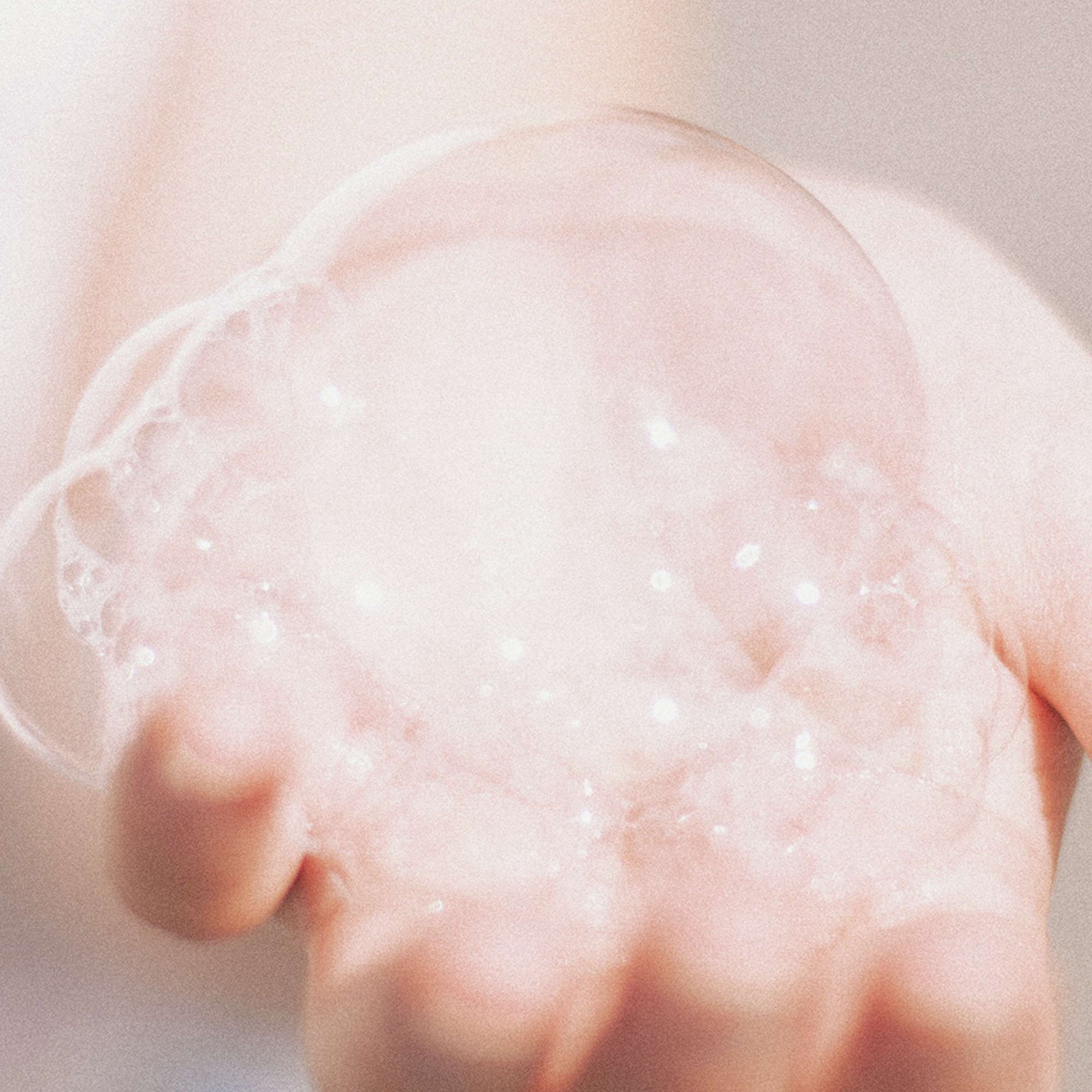 hand holding bubbles