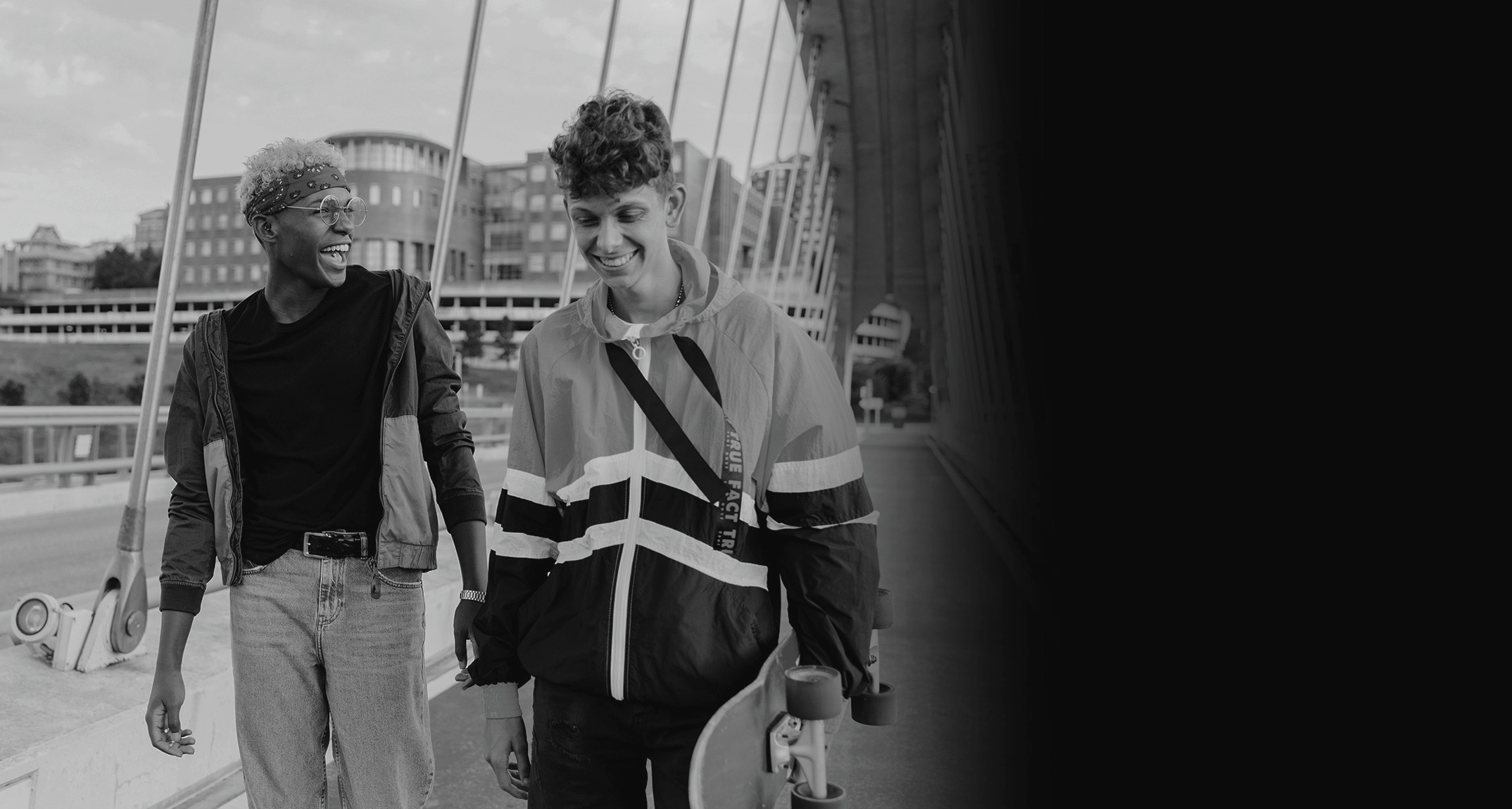 two young boys walking and laughing