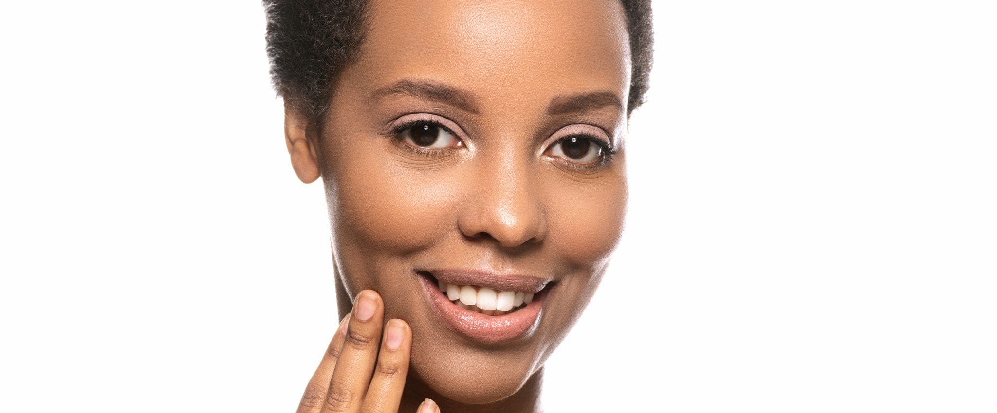 Photo of African woman with clean healthy skin on white background