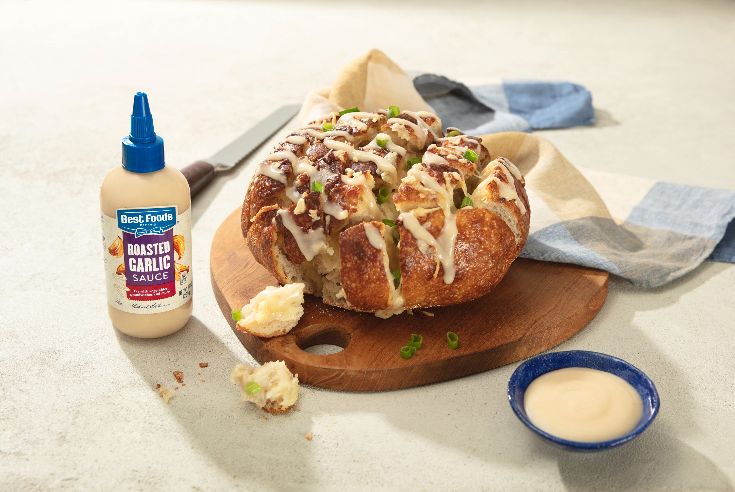 roasted garlic sauce on cheesy bread