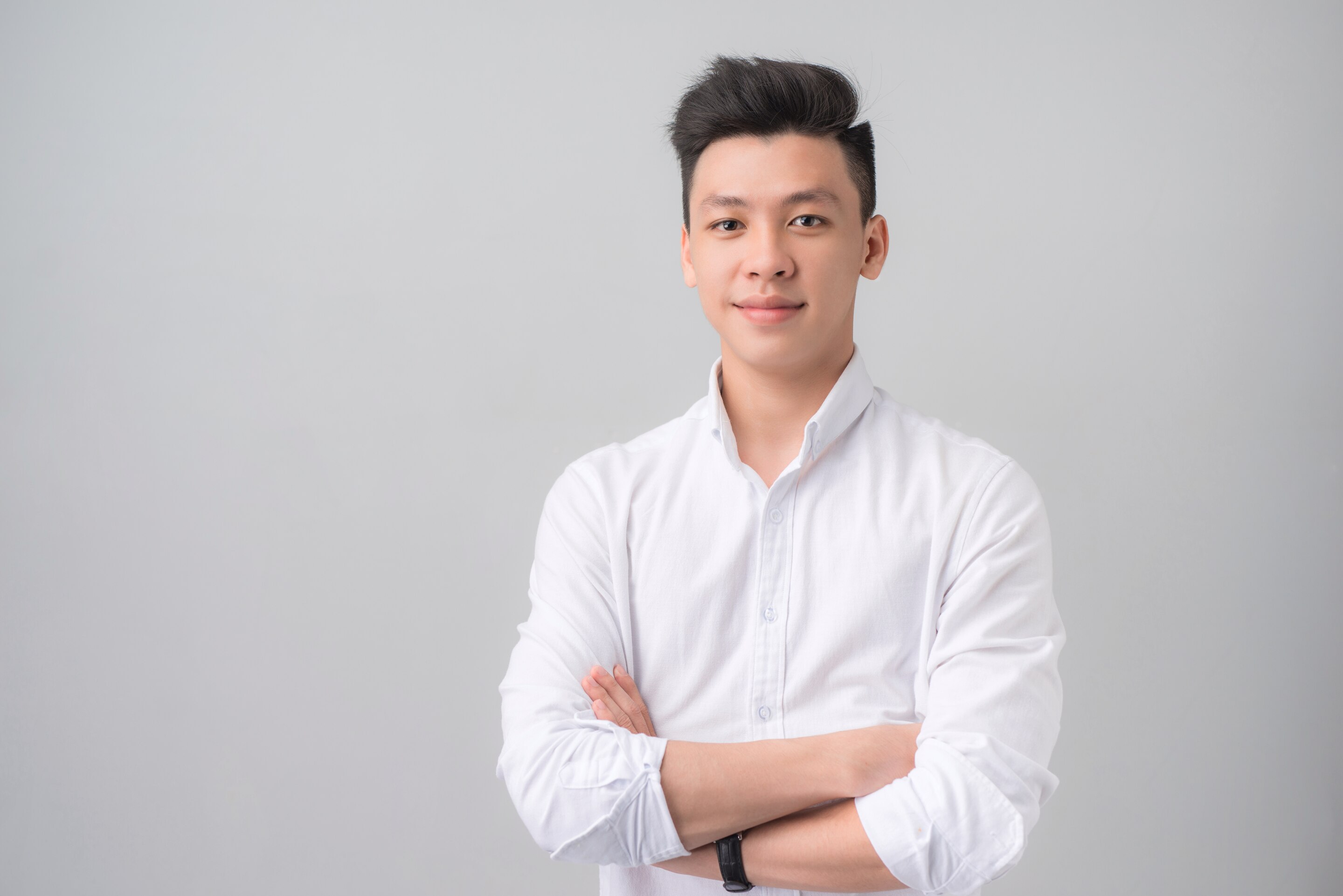 Asian man wearing a white shirt