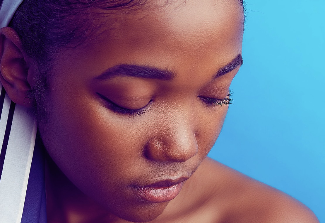 Closeup of Black woman with sensitive skin