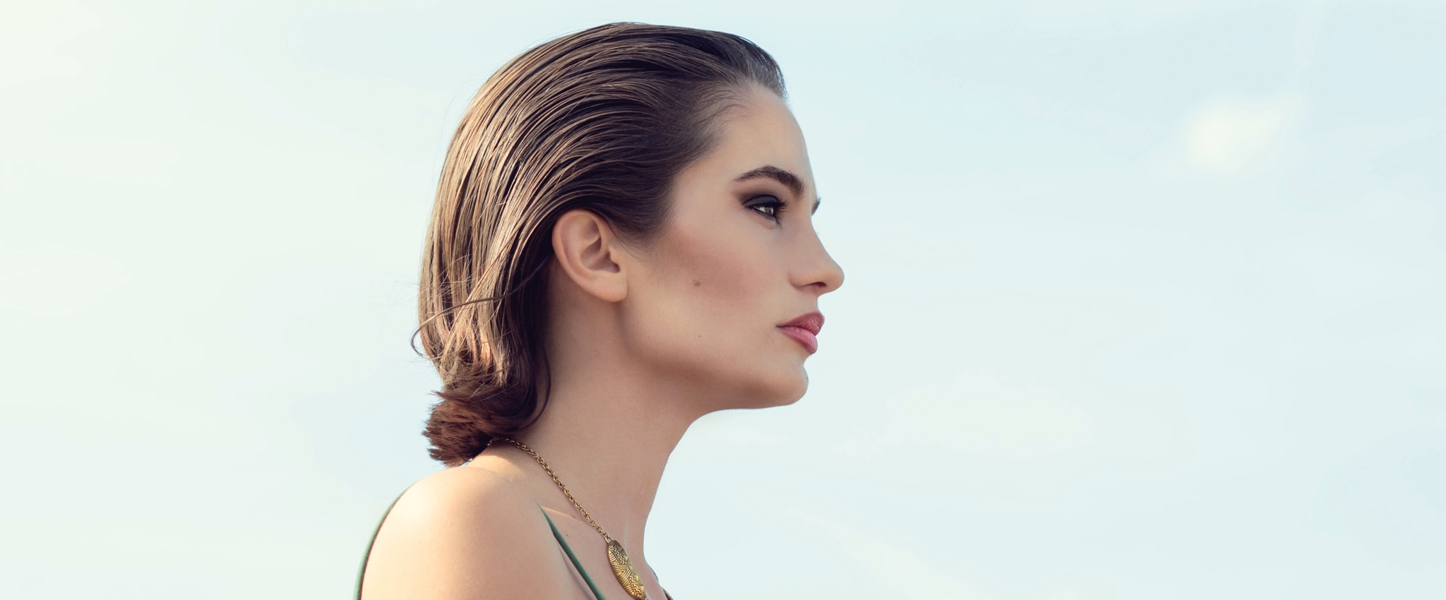 Woman with hair slicked back