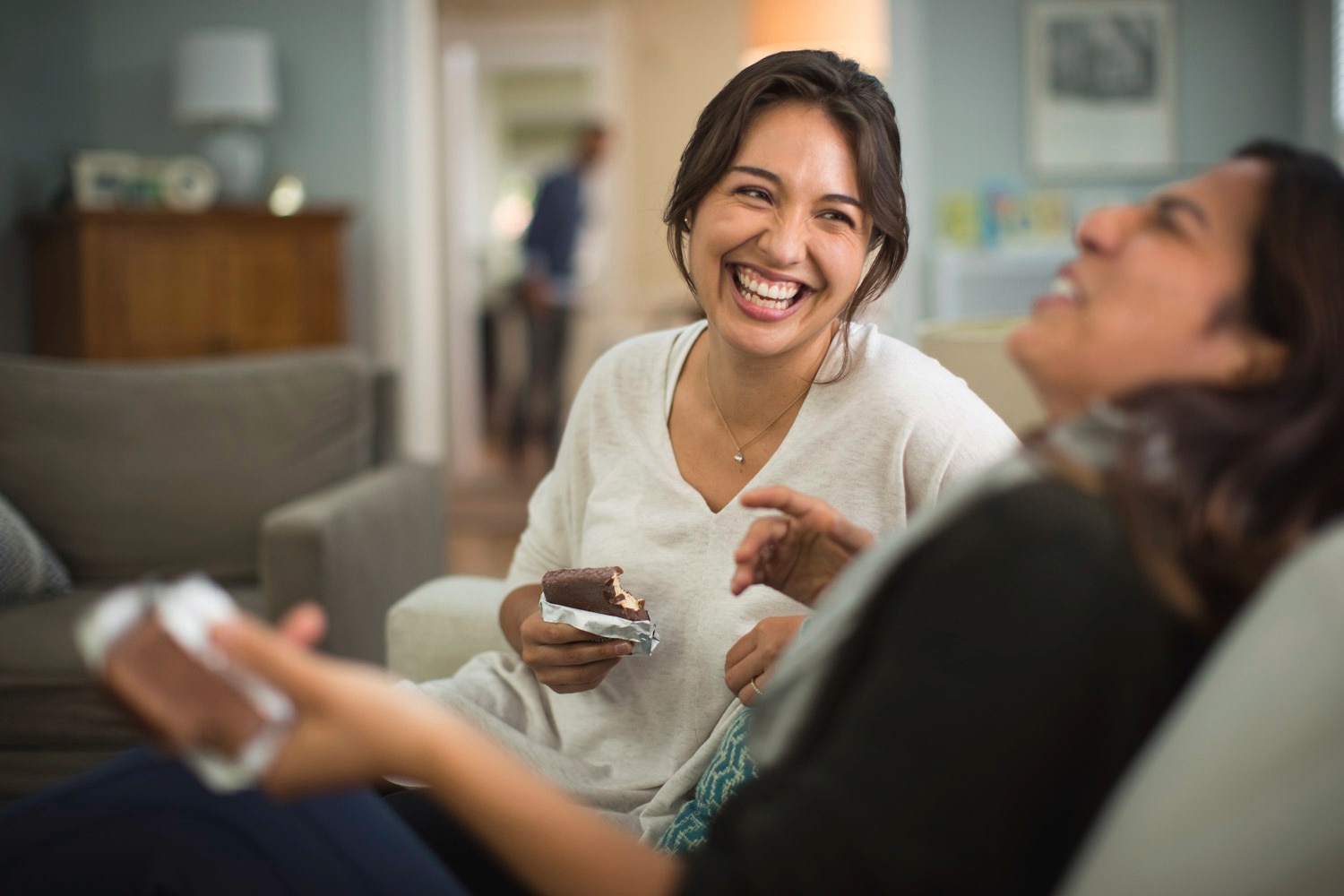 Two girls chatting and smiling