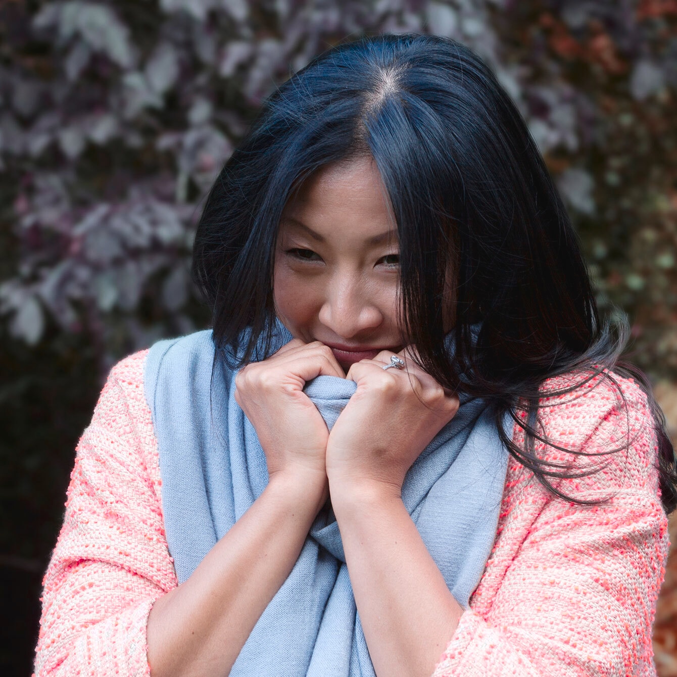 Woman standing outside and smiling
