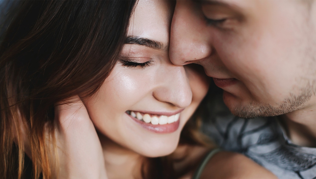 girl smiling with her boyfriend
