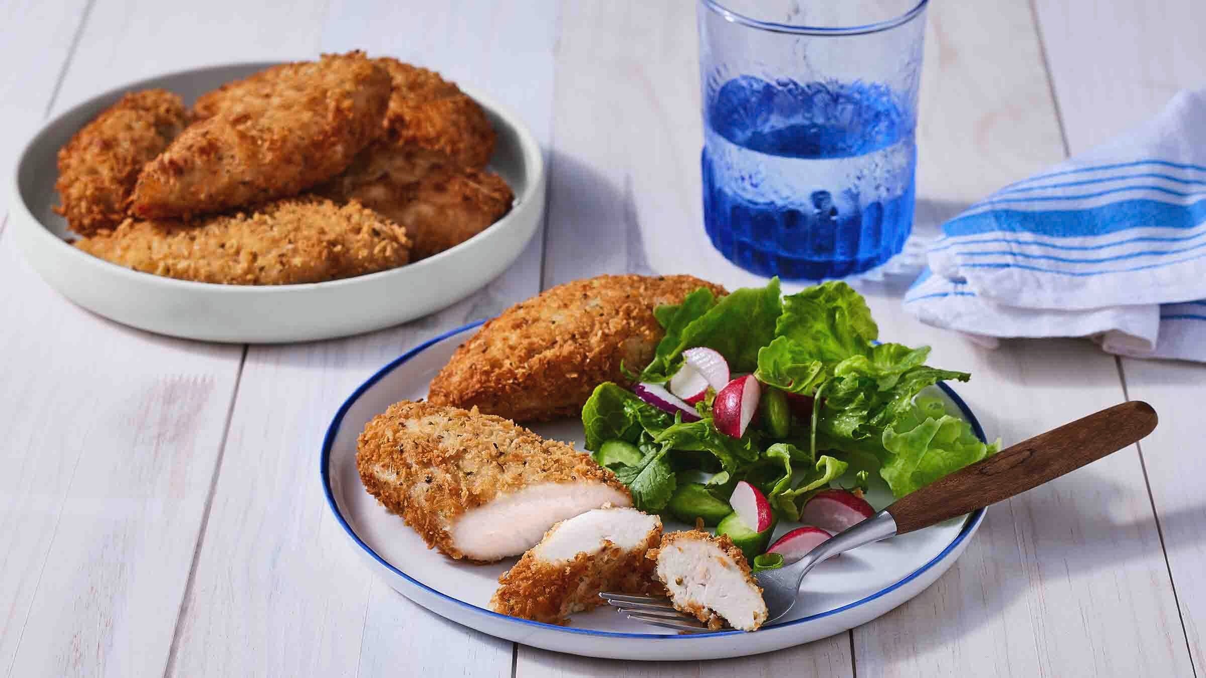 breaded chicken breast with side salad
