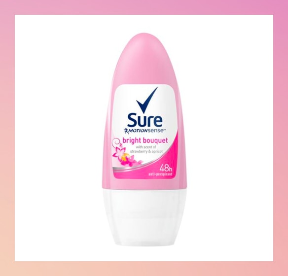 Pretty girl behind plant